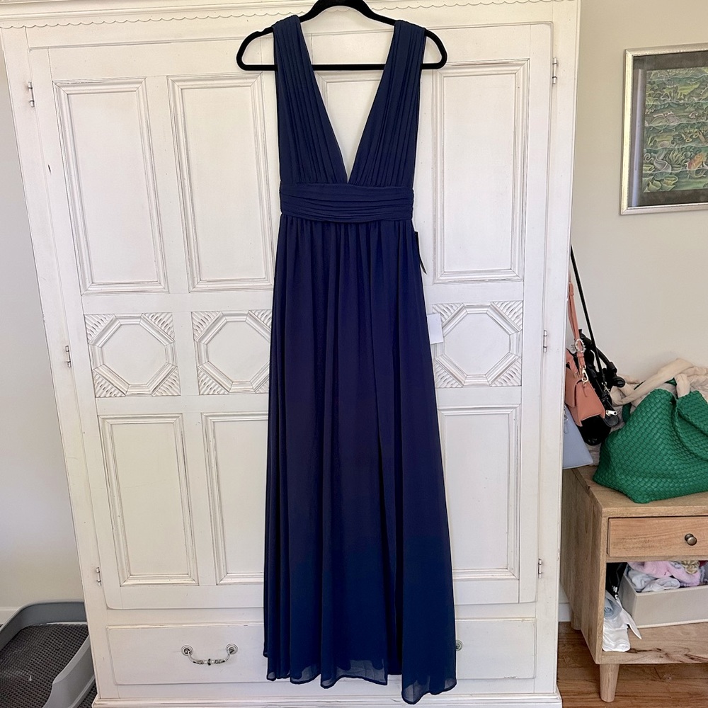Lulu’s navy floor length gown with slit on left thigh. Never worn, size XS
